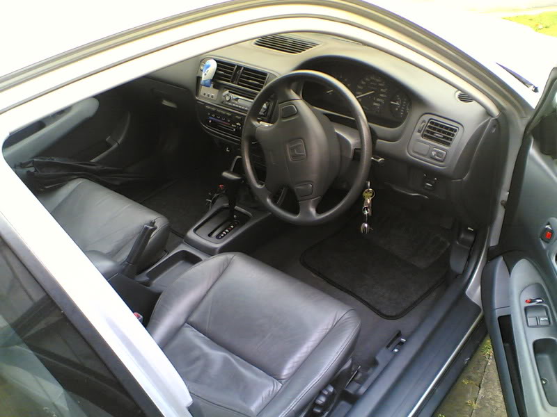Name: civic_door.jpg
Views: 79
Size: 75.1 KB